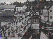 May 20th, 1910.  King Edward's Memorial Day at Gananoque, showing the King St. Bridge, foreground.